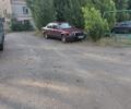 Красный БМВ 7 Серия, объемом двигателя 3.4 л и пробегом 555 тыс. км за 2418 $, фото 1 на Automoto.ua