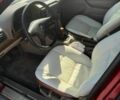 Красный БМВ 7 Серия, объемом двигателя 3.4 л и пробегом 555 тыс. км за 2418 $, фото 6 на Automoto.ua