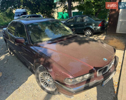 Красный БМВ 7 Серия, объемом двигателя 2.99 л и пробегом 777 тыс. км за 2999 $, фото 3 на Automoto.ua