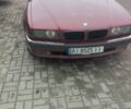 Красный БМВ 7 Серия, объемом двигателя 3.5 л и пробегом 350 тыс. км за 3500 $, фото 1 на Automoto.ua