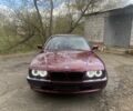 Красный БМВ 7 Серия, объемом двигателя 3.5 л и пробегом 372 тыс. км за 5400 $, фото 1 на Automoto.ua