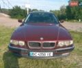 Красный БМВ 7 Серия, объемом двигателя 2.8 л и пробегом 240 тыс. км за 3650 $, фото 1 на Automoto.ua