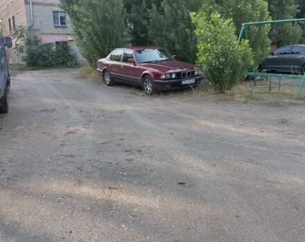 Красный БМВ 7 Серия, объемом двигателя 3.4 л и пробегом 555 тыс. км за 2418 $, фото 1 на Automoto.ua