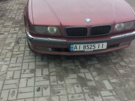 Червоний БМВ 7 Серія, об'ємом двигуна 3.5 л та пробігом 400 тис. км за 3500 $, фото 1 на Automoto.ua