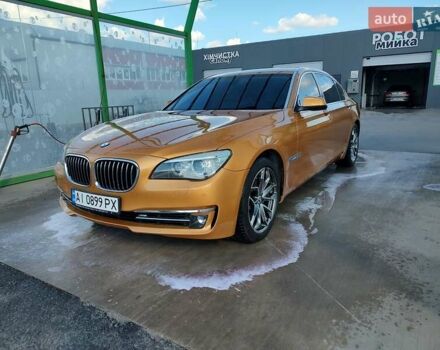 Желтый БМВ 7 Серия, объемом двигателя 4.39 л и пробегом 160 тыс. км за 14000 $, фото 1 на Automoto.ua