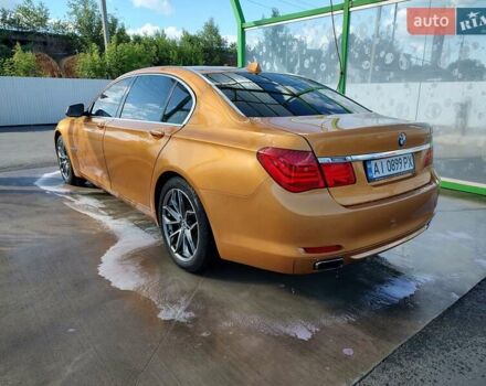 Желтый БМВ 7 Серия, объемом двигателя 4.39 л и пробегом 160 тыс. км за 14000 $, фото 3 на Automoto.ua