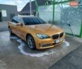 Желтый БМВ 7 Серия, объемом двигателя 4.39 л и пробегом 160 тыс. км за 14000 $, фото 1 на Automoto.ua