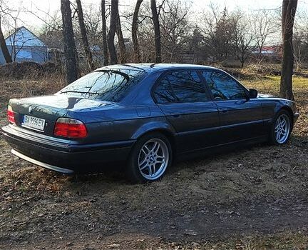 Серый БМВ 7 Серия, объемом двигателя 3.5 л и пробегом 398 тыс. км за 5500 $, фото 5 на Automoto.ua