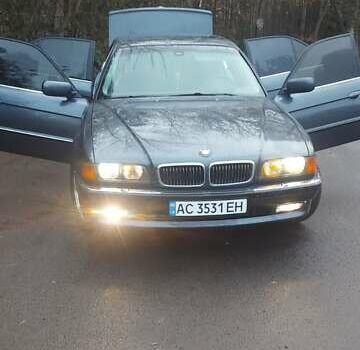 Серый БМВ 7 Серия, объемом двигателя 2.5 л и пробегом 426 тыс. км за 4800 $, фото 1 на Automoto.ua