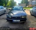 Серый БМВ 7 Серия, объемом двигателя 4.4 л и пробегом 300 тыс. км за 2500 $, фото 1 на Automoto.ua