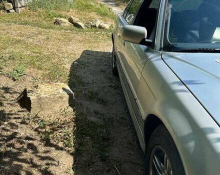 Серый БМВ 7 Серия, объемом двигателя 3.5 л и пробегом 380 тыс. км за 2950 $, фото 3 на Automoto.ua