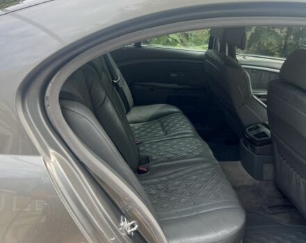 Серый БМВ 7 Серия, объемом двигателя 4.4 л и пробегом 285 тыс. км за 7100 $, фото 2 на Automoto.ua