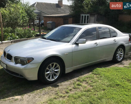 Серый БМВ 7 Серия, объемом двигателя 4.4 л и пробегом 420 тыс. км за 5200 $, фото 5 на Automoto.ua