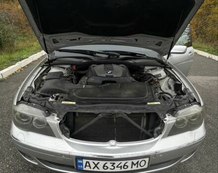 Серый БМВ 7 Серия, объемом двигателя 4 л и пробегом 327 тыс. км за 8300 $, фото 6 на Automoto.ua