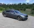 Серый БМВ 7 Серия, объемом двигателя 2.99 л и пробегом 445 тыс. км за 12200 $, фото 1 на Automoto.ua