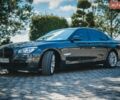 Сірий БМВ 7 Серія, об'ємом двигуна 3 л та пробігом 157 тис. км за 16499 $, фото 1 на Automoto.ua