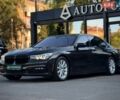 Сірий БМВ 7 Серія, об'ємом двигуна 3 л та пробігом 122 тис. км за 28999 $, фото 1 на Automoto.ua