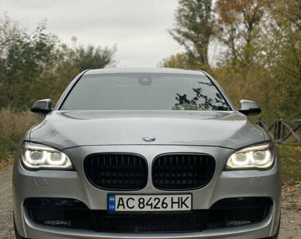 Серый БМВ 7 Серия, объемом двигателя 2.98 л и пробегом 128 тыс. км за 18000 $, фото 1 на Automoto.ua