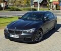 Серый БМВ 7 Серия, объемом двигателя 2.98 л и пробегом 88 тыс. км за 31500 $, фото 1 на Automoto.ua