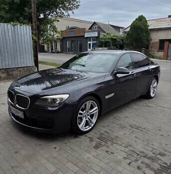 Серый БМВ 7 Серия, объемом двигателя 2.99 л и пробегом 280 тыс. км за 25000 $, фото 1 на Automoto.ua
