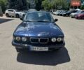Синий БМВ 7 Серия, объемом двигателя 4 л и пробегом 380 тыс. км за 5000 $, фото 1 на Automoto.ua