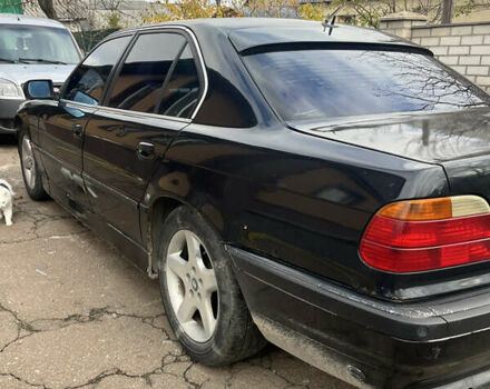 Синий БМВ 7 Серия, объемом двигателя 3 л и пробегом 400 тыс. км за 3200 $, фото 4 на Automoto.ua