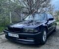 Синій БМВ 7 Серія, об'ємом двигуна 3 л та пробігом 450 тис. км за 4200 $, фото 1 на Automoto.ua