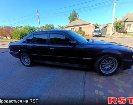 Синий БМВ 7 Серия, объемом двигателя 3.5 л и пробегом 293 тыс. км за 4300 $, фото 3 на Automoto.ua