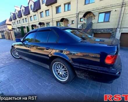 Синий БМВ 7 Серия, объемом двигателя 3.5 л и пробегом 293 тыс. км за 4300 $, фото 2 на Automoto.ua