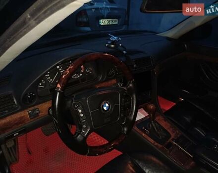 Синий БМВ 7 Серия, объемом двигателя 4.4 л и пробегом 460 тыс. км за 5500 $, фото 5 на Automoto.ua