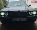 Синий БМВ 7 Серия, объемом двигателя 3 л и пробегом 563 тыс. км за 6000 $, фото 1 на Automoto.ua