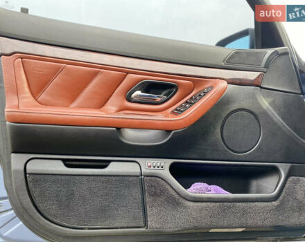 Синий БМВ 7 Серия, объемом двигателя 3 л и пробегом 546 тыс. км за 7500 $, фото 6 на Automoto.ua