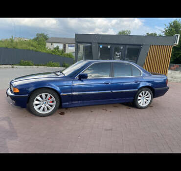 Синій БМВ 7 Серія, об'ємом двигуна 3 л та пробігом 192 тис. км за 8888 $, фото 53 на Automoto.ua