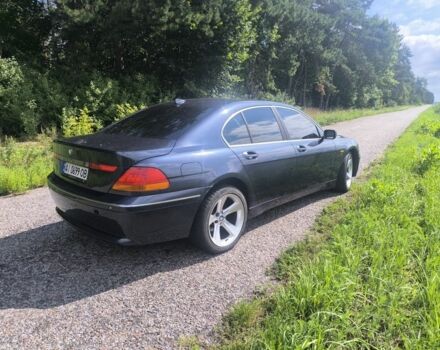 Синий БМВ 7 Серия, объемом двигателя 3.6 л и пробегом 320 тыс. км за 5500 $, фото 2 на Automoto.ua