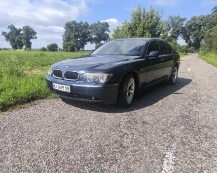 Синий БМВ 7 Серия, объемом двигателя 3.6 л и пробегом 320 тыс. км за 5500 $, фото 1 на Automoto.ua