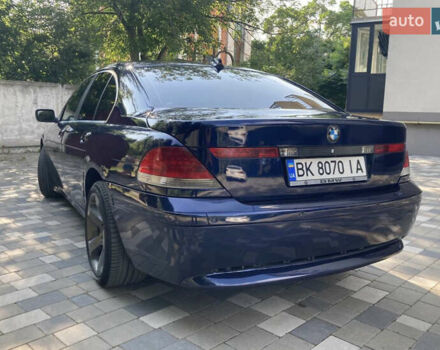 Синий БМВ 7 Серия, объемом двигателя 2.99 л и пробегом 585 тыс. км за 5800 $, фото 2 на Automoto.ua