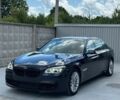 Синій БМВ 7 Серія, об'ємом двигуна 3 л та пробігом 157 тис. км за 18750 $, фото 1 на Automoto.ua