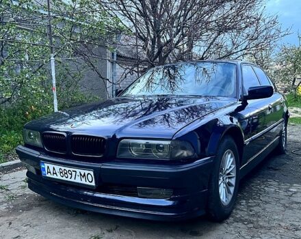 Синий БМВ 7 Серия, объемом двигателя 3 л и пробегом 440 тыс. км за 4000 $, фото 1 на Automoto.ua
