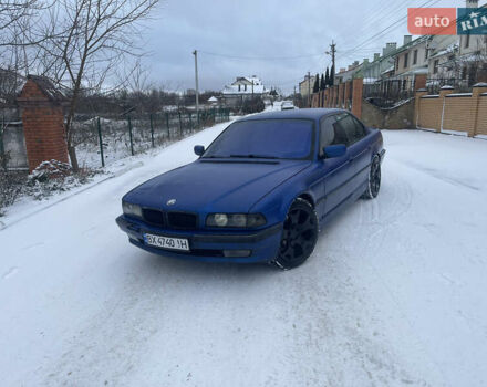 Синий БМВ 7 Серия, объемом двигателя 4 л и пробегом 388 тыс. км за 5000 $, фото 1 на Automoto.ua