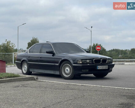 Синий БМВ 7 Серия, объемом двигателя 4 л и пробегом 450 тыс. км за 4200 $, фото 1 на Automoto.ua