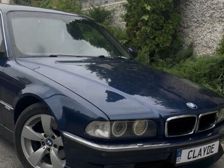 Синий БМВ 7 Серия, объемом двигателя 4.4 л и пробегом 400 тыс. км за 5500 $, фото 1 на Automoto.ua