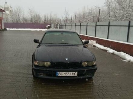 Синий БМВ 7 Серия, объемом двигателя 3.5 л и пробегом 415 тыс. км за 4950 $, фото 1 на Automoto.ua