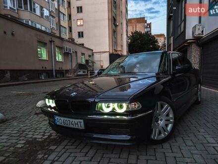 Синий БМВ 7 Серия, объемом двигателя 3 л и пробегом 440 тыс. км за 6000 $, фото 1 на Automoto.ua