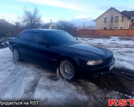 Синий БМВ 7 Серия, объемом двигателя 3.5 л и пробегом 300 тыс. км за 4200 $, фото 1 на Automoto.ua
