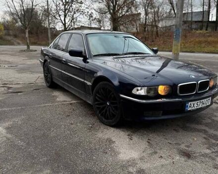 Синий БМВ 7 Серия, объемом двигателя 4.4 л и пробегом 470 тыс. км за 4600 $, фото 1 на Automoto.ua