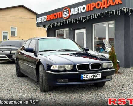 Синий БМВ 7 Серия, объемом двигателя 4.4 л и пробегом 400 тыс. км за 4000 $, фото 1 на Automoto.ua