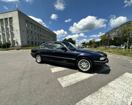 Синий БМВ 7 Серия, объемом двигателя 3 л и пробегом 784 тыс. км за 6000 $, фото 1 на Automoto.ua