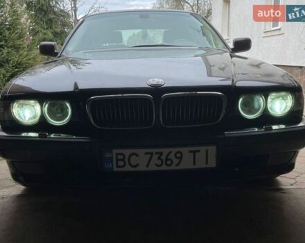 Синий БМВ 7 Серия, объемом двигателя 3 л и пробегом 563 тыс. км за 6000 $, фото 1 на Automoto.ua