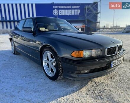 Синий БМВ 7 Серия, объемом двигателя 3 л и пробегом 172 тыс. км за 12000 $, фото 1 на Automoto.ua
