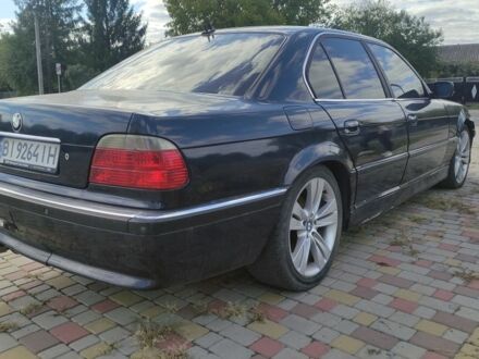 Синій БМВ 7 Серія, об'ємом двигуна 4.4 л та пробігом 500 тис. км за 2700 $, фото 1 на Automoto.ua